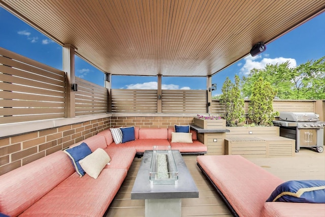 2011 W Huron St, Chicago, IL 60612 - fenced backyard featuring outdoor lounge area, grilling area, and a patio area