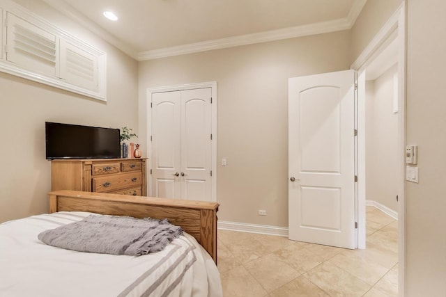 2011 W Huron St, Chicago, IL 60612 - bedroom with crown molding, a closet, recessed lighting, and light tile patterned floors