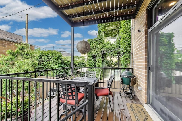 2011 W Huron St, Chicago, IL 60612 - wooden terrace featuring a grill and outdoor dining area