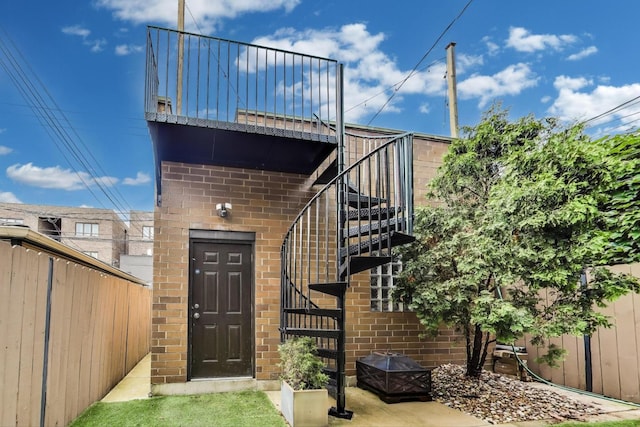 2011 W Huron St, Chicago, IL 60612 - view of exterior entry featuring brick siding