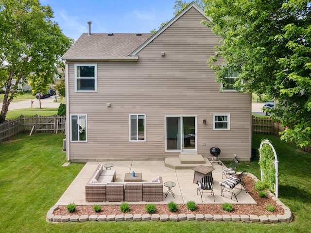 10154 Ashley St, Huntley, IL 60142 - rear view of house featuring a fenced backyard, a patio area, an outdoor hangout area, and a shingled roof