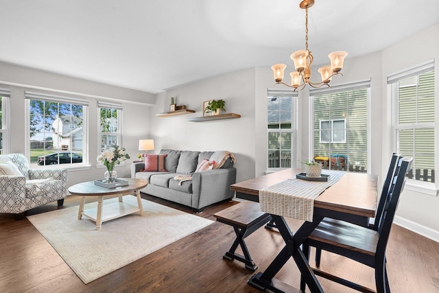 10154 Ashley St, Huntley, IL 60142 - living area featuring a chandelier and dark wood-style flooring