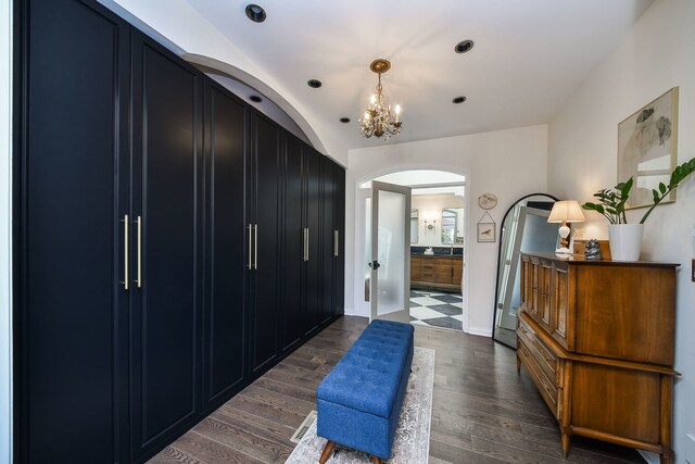 72 Gray St, Saint Charles, IL 60174 - foyer entrance with arched walkways, dark wood finished floors, a chandelier, lofted ceiling, and recessed lighting