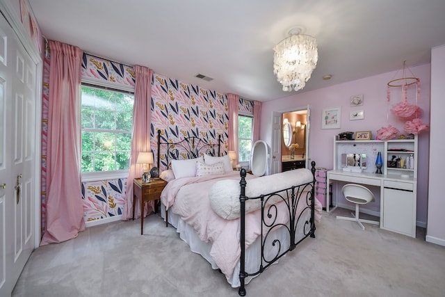 72 Gray St, Saint Charles, IL 60174 - bedroom featuring a chandelier, light carpet, and connected bathroom