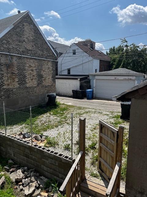 2911 W 25th St, Chicago, IL 60623 - view of side of home with brick siding