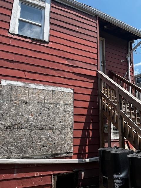 2911 W 25th St, Chicago, IL 60623 - view of side of home featuring stairway