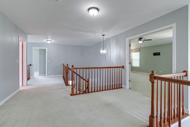 2208 Sanctuary Ct, Gurnee, IL 60031 - corridor with an upstairs landing, carpet floors, and a chandelier