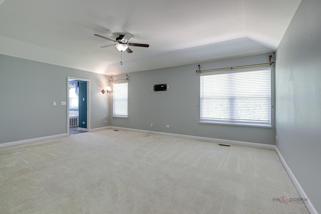 2208 Sanctuary Ct, Gurnee, IL 60031 - empty room featuring ceiling fan, light colored carpet, and vaulted ceiling