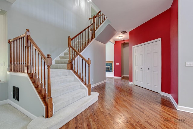 2208 Sanctuary Ct, Gurnee, IL 60031 - stairs with arched walkways and wood finished floors
