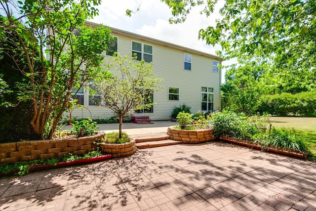 2208 Sanctuary Ct, Gurnee, IL 60031 - rear view of property featuring a patio