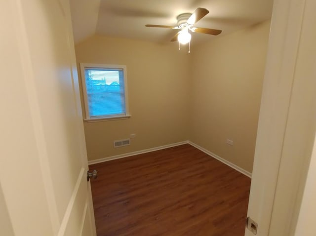 4936 W Harrison St, Chicago, IL 60644 - spare room with ceiling fan, dark wood-style flooring, and vaulted ceiling