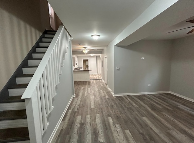 4936 W Harrison St, Chicago, IL 60644 - staircase featuring a ceiling fan and wood finished floors