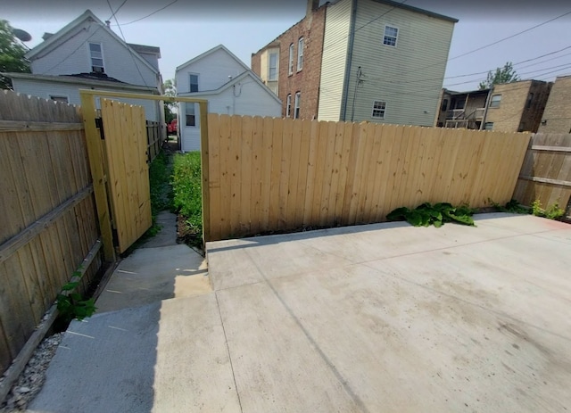 4936 W Harrison St, Chicago, IL 60644 - fenced backyard with a patio area