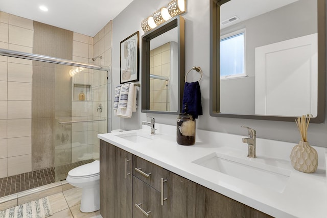 1538 W 21st St Unit 1, Chicago, IL 60608 - bathroom featuring double vanity, a shower stall, and tile patterned floors