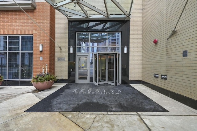 420 E Waterside Dr Unit 1302, Chicago, IL 60601 - property entrance with brick siding and a patio