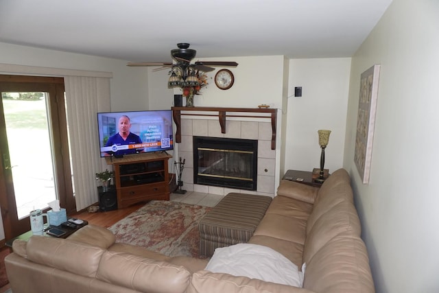 4914 W State Route 113, Kankakee, IL 60901 - living area with a tiled fireplace, a ceiling fan, and wood finished floors