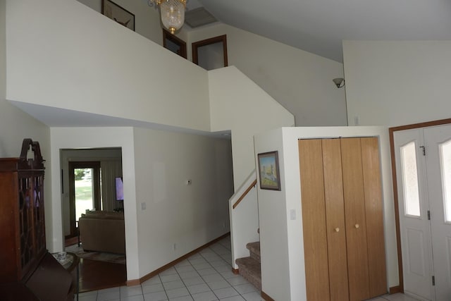 4914 W State Route 113, Kankakee, IL 60901 - entrance foyer with light tile patterned floors, stairs, and high vaulted ceiling