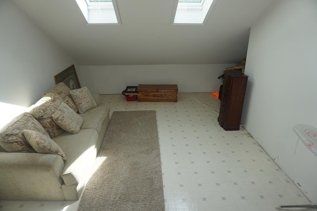 4914 W State Route 113, Kankakee, IL 60901 - living area featuring light floors, a skylight, and lofted ceiling