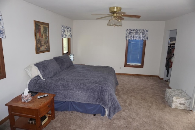 4914 W State Route 113, Kankakee, IL 60901 - carpeted bedroom featuring baseboards and ceiling fan