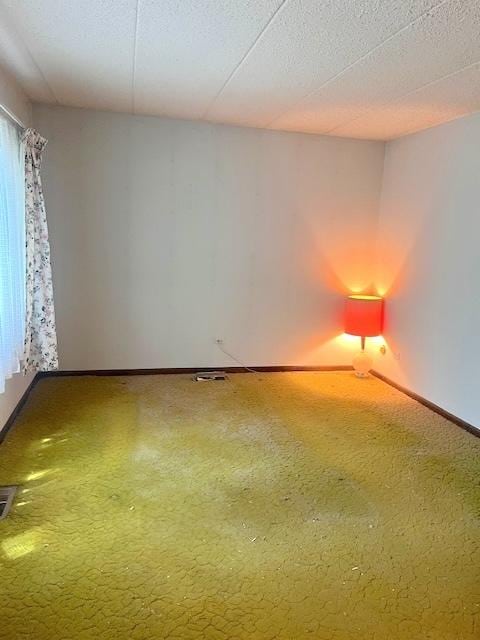 9550 Mason Ave Unit 2, Oak Lawn, IL 60453 - carpeted empty room with baseboards and a textured ceiling