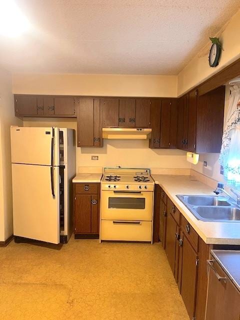 9550 Mason Ave Unit 2, Oak Lawn, IL 60453 - kitchen with white appliances, under cabinet range hood, and light countertops