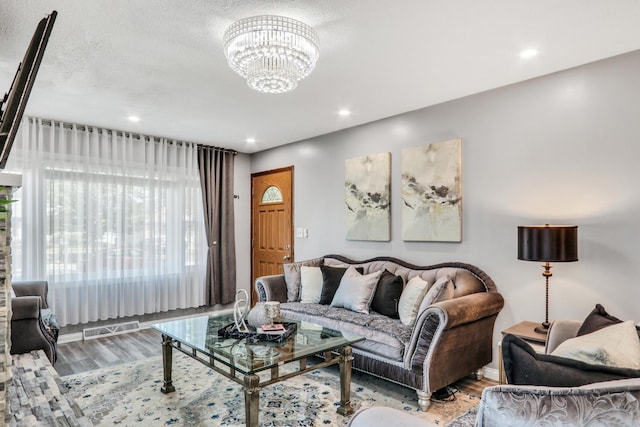 308 Dalton Ave, Mundelein, IL 60060 - living room with light wood-type flooring, a chandelier, and recessed lighting