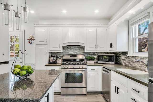 308 Dalton Ave, Mundelein, IL 60060 - kitchen featuring stainless steel appliances, premium range hood, white cabinets, and recessed lighting