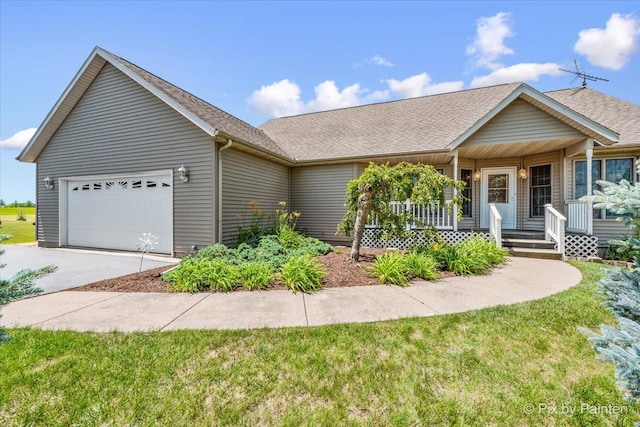 31-58 Wakonda Dr, Lake Carroll, IL 61046 - ranch-style home with concrete driveway, a garage, a shingled roof, and a porch
