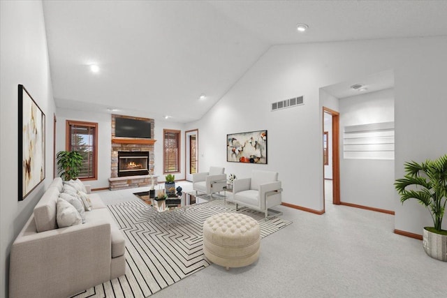 31-58 Wakonda Dr, Lake Carroll, IL 61046 - living room with carpet floors, high vaulted ceiling, a stone fireplace, and recessed lighting