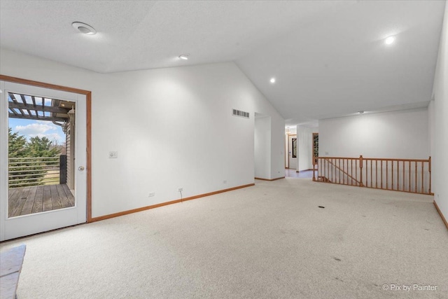 31-58 Wakonda Dr, Lake Carroll, IL 61046 - spare room with carpet flooring, vaulted ceiling, and recessed lighting