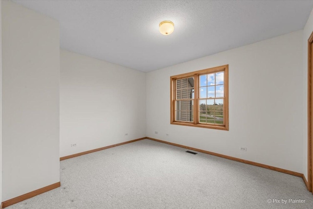 31-58 Wakonda Dr, Lake Carroll, IL 61046 - carpeted empty room with baseboards