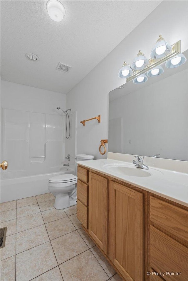31-58 Wakonda Dr, Lake Carroll, IL 61046 - full bathroom with vanity, bathing tub / shower combination, tile patterned flooring, and a textured ceiling
