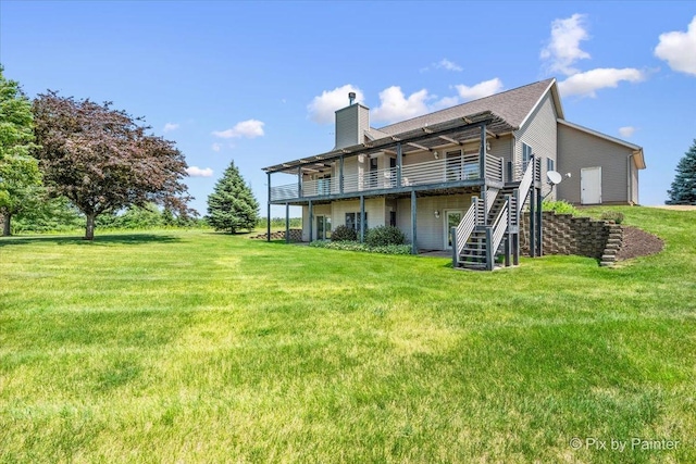 31-58 Wakonda Dr, Lake Carroll, IL 61046 - back of property with a wooden deck, a chimney, a yard, and stairs