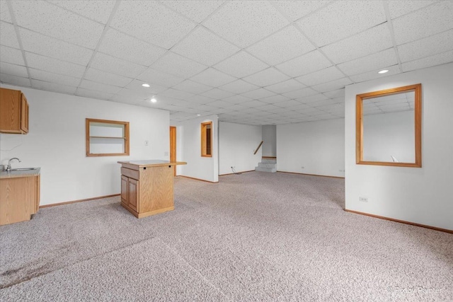 31-58 Wakonda Dr, Lake Carroll, IL 61046 - unfurnished living room featuring light colored carpet, a paneled ceiling, recessed lighting, and stairway