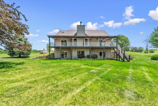31-58 Wakonda Dr, Lake Carroll, IL 61046 - rear view of house with a deck, a lawn, a chimney, and stairs