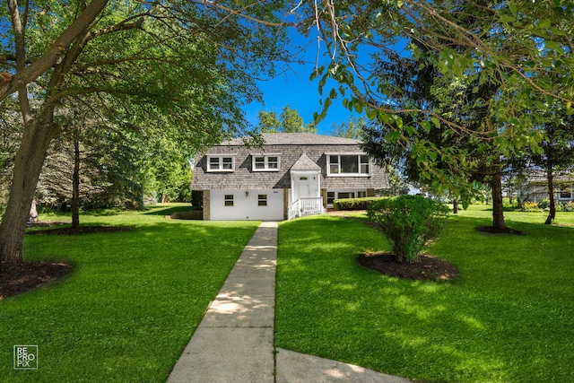 19228 W Quail Ct, Elwood, IL 60421 - split foyer home with a front lawn and a shingled roof