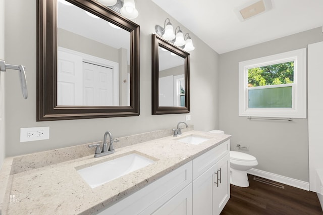 19228 W Quail Ct, Elwood, IL 60421 - bathroom featuring double vanity, wood finished floors, and a bathtub