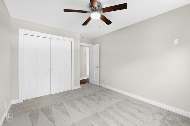 19228 W Quail Ct, Elwood, IL 60421 - unfurnished bedroom featuring carpet floors, a closet, and a ceiling fan