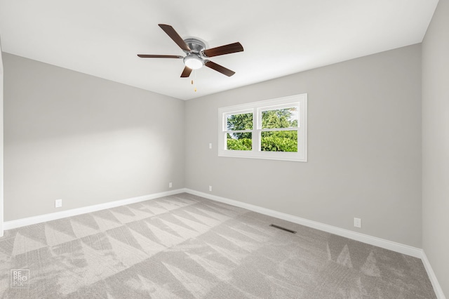 19228 W Quail Ct, Elwood, IL 60421 - spare room featuring carpet and a ceiling fan