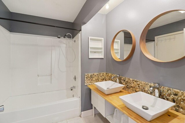 822 Texas Ct, Carol Stream, IL 60188 - bathroom with shower / bathtub combination, double vanity, and tile patterned floors
