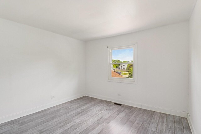822 Texas Ct, Carol Stream, IL 60188 - empty room featuring light wood finished floors