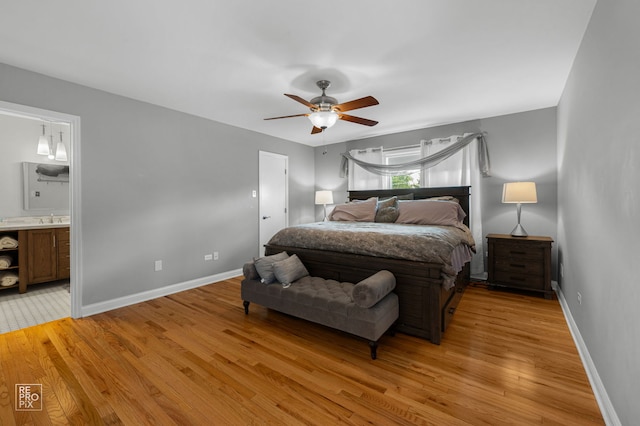 8909 Silverdale Dr Unit 5C, Orland Park, IL 60462 - bedroom featuring light wood-type flooring, ensuite bath, and ceiling fan