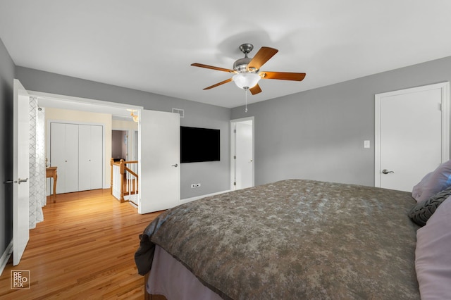 8909 Silverdale Dr Unit 5C, Orland Park, IL 60462 - bedroom featuring light wood finished floors and a ceiling fan