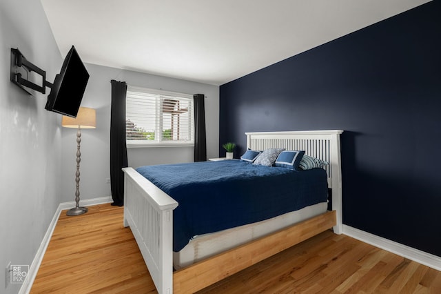 8909 Silverdale Dr Unit 5C, Orland Park, IL 60462 - bedroom with wood finished floors and baseboards