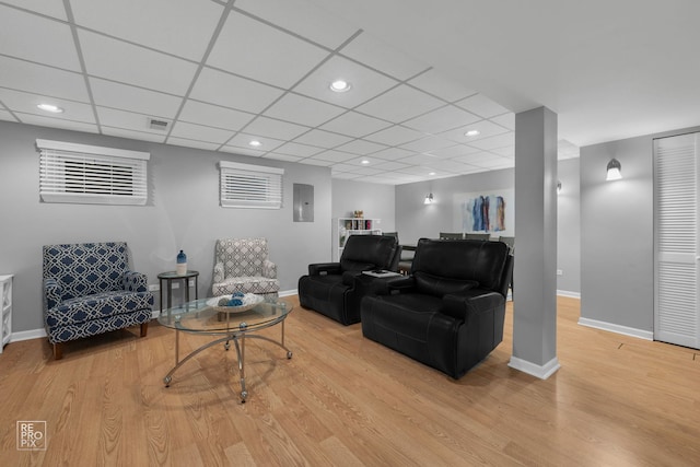 8909 Silverdale Dr Unit 5C, Orland Park, IL 60462 - living area featuring electric panel, light wood-style floors, recessed lighting, and a drop ceiling