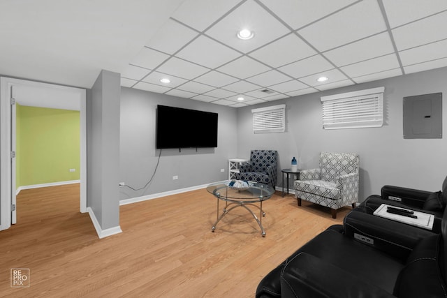 8909 Silverdale Dr Unit 5C, Orland Park, IL 60462 - living area featuring electric panel, recessed lighting, light wood-type flooring, and a drop ceiling