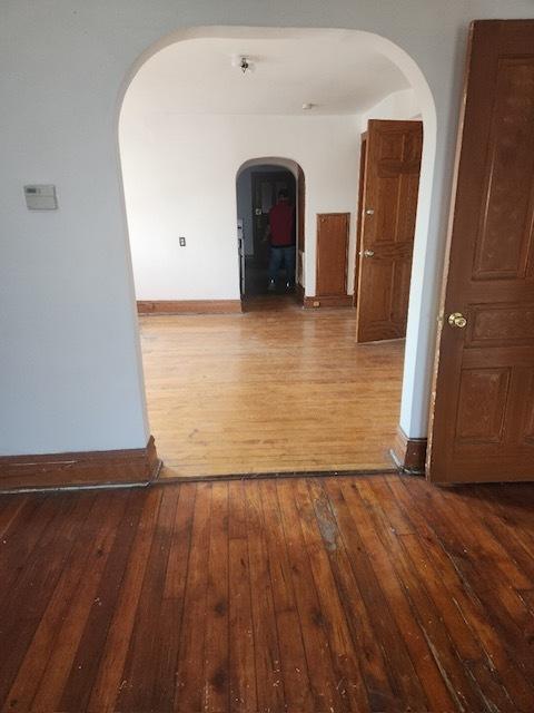 2349 W Grenshaw St, Chicago, IL 60612 - hall with arched walkways and wood-type flooring