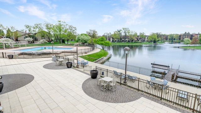 601 Lake Hinsdale Dr Unit 209, Willowbrook, IL 60527 - view of patio / terrace featuring a water view and an outdoor pool