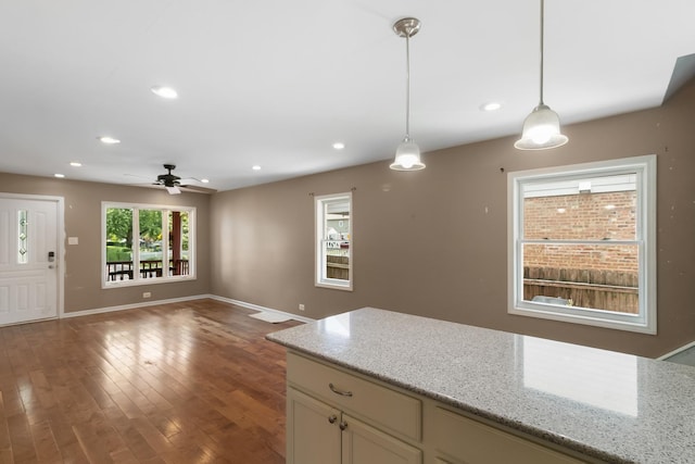3326 W 107th St, Chicago, IL 60655 - kitchen with decorative light fixtures, recessed lighting, wood finished floors, a ceiling fan, and light stone countertops