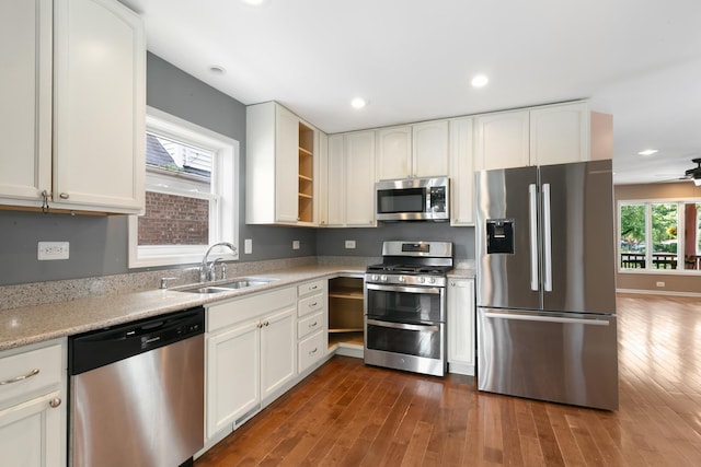 3326 W 107th St, Chicago, IL 60655 - kitchen featuring appliances with stainless steel finishes, white cabinets, dark wood-type flooring, recessed lighting, and open shelves
